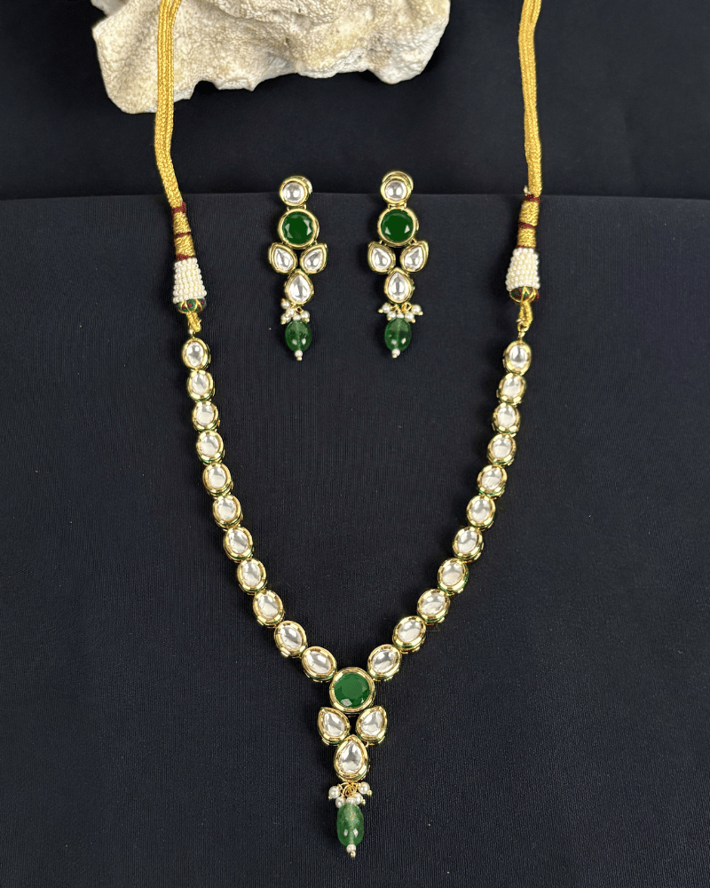 Eshanya Single Line Kundan Necklace With Emerald Drop