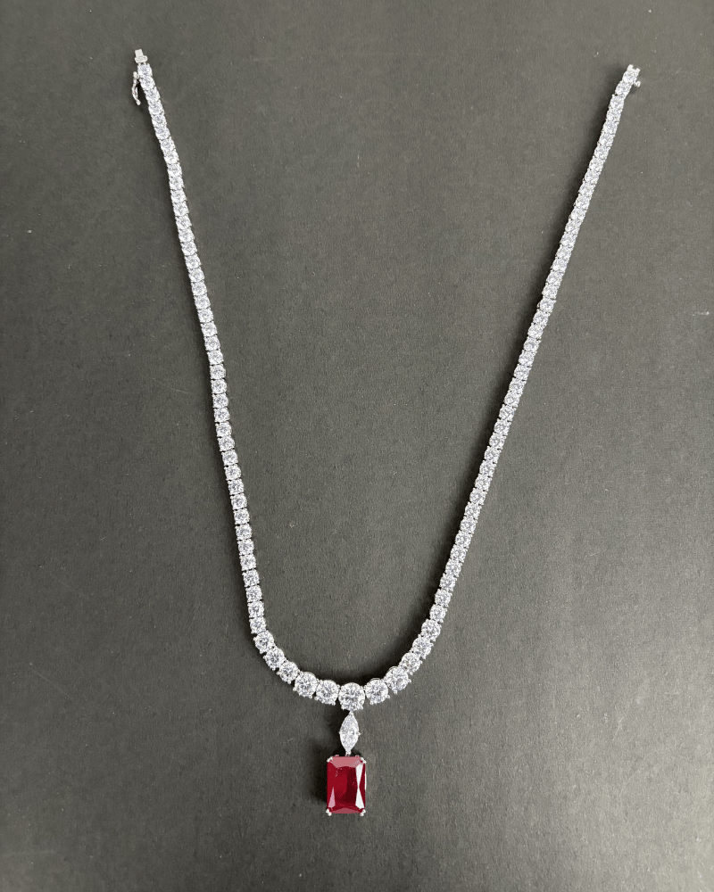 Single Line Solitaire Necklace In Ruby Drop | Rhodium Plating