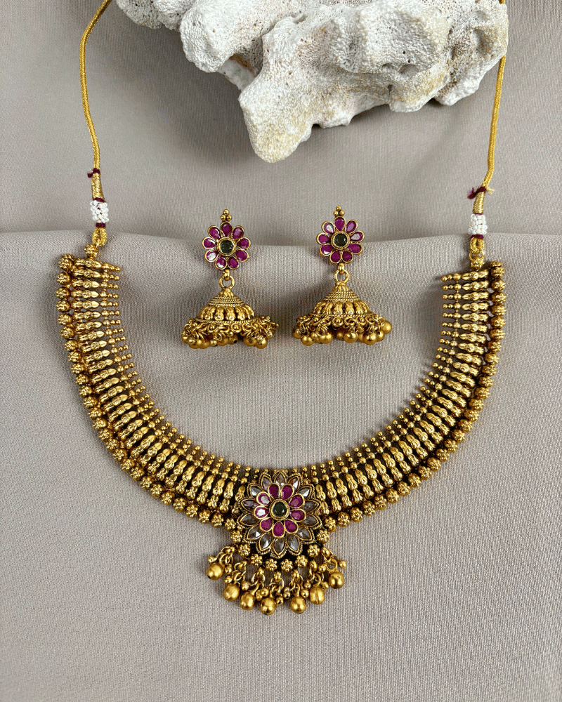 Rajshree Golden Haar In Ruby Broach